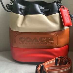 Coach Field Bucket Bag With Colorblock Quilting And Coach Badge